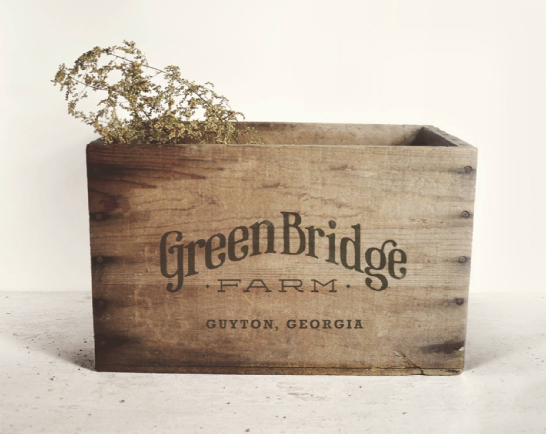 Green Bridge Farm logo on wooden crate