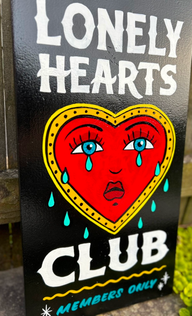Lonely Hearts Club sign