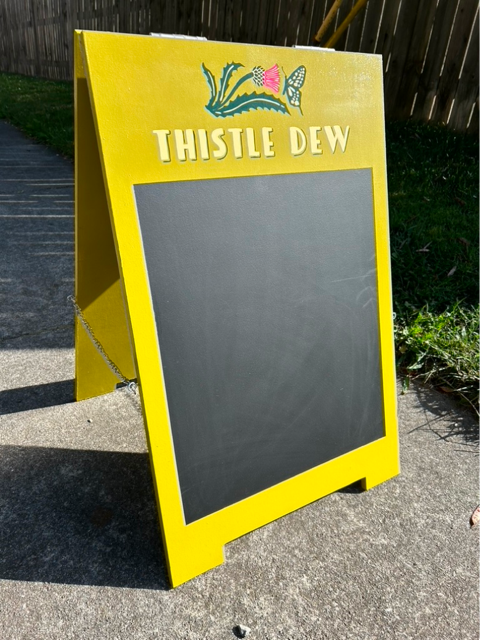 Thistle Dew A-frame chalkboard sign