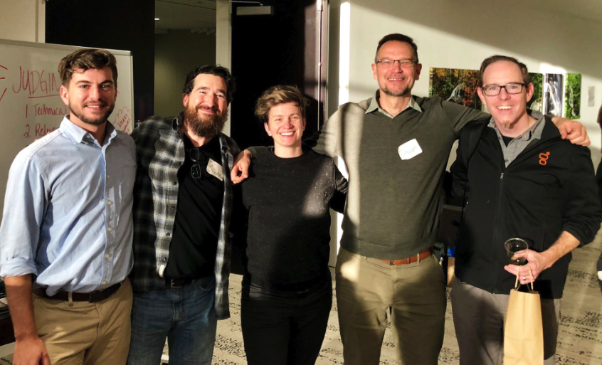 The winning hackathon team celebrating after the event